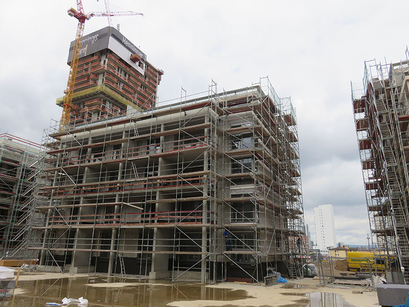 Neubau Wohnanlage „Am Henninger Turm“ Frankfurt, Errichtung von 12 Mehrfamilienhäusern, 1 Tiefgarage u. 2 Reihenhausgruppen