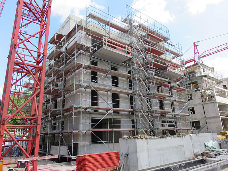 Neubau Wohnanlage „Am Henninger Turm“ Frankfurt, Errichtung von 12 Mehrfamilienhäusern, 1 Tiefgarage u. 2 Reihenhausgruppen